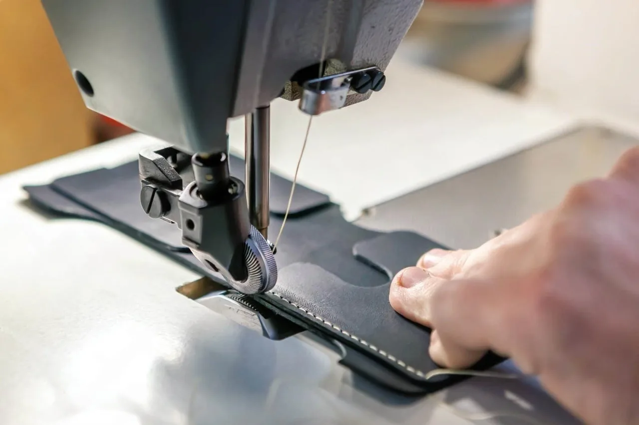 close up professional sewing machine leather work 184834177