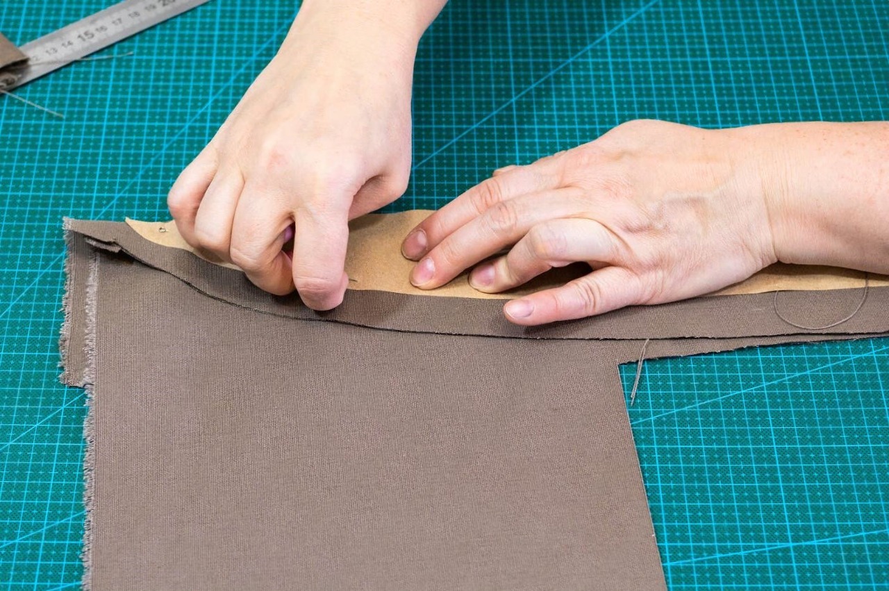 craftsman pins pattern to materials workshop making textile leather travel bag paper 129943106