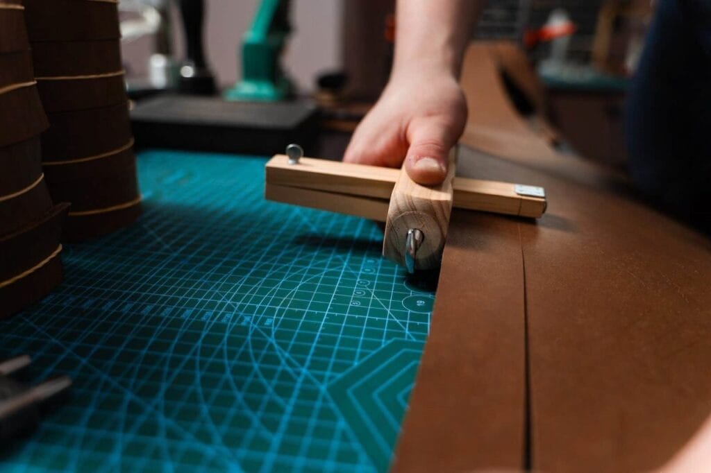 handmade leather belt preparation wooden strap cutter cutting mat artisan cutting leather strip wooden tool 404922057